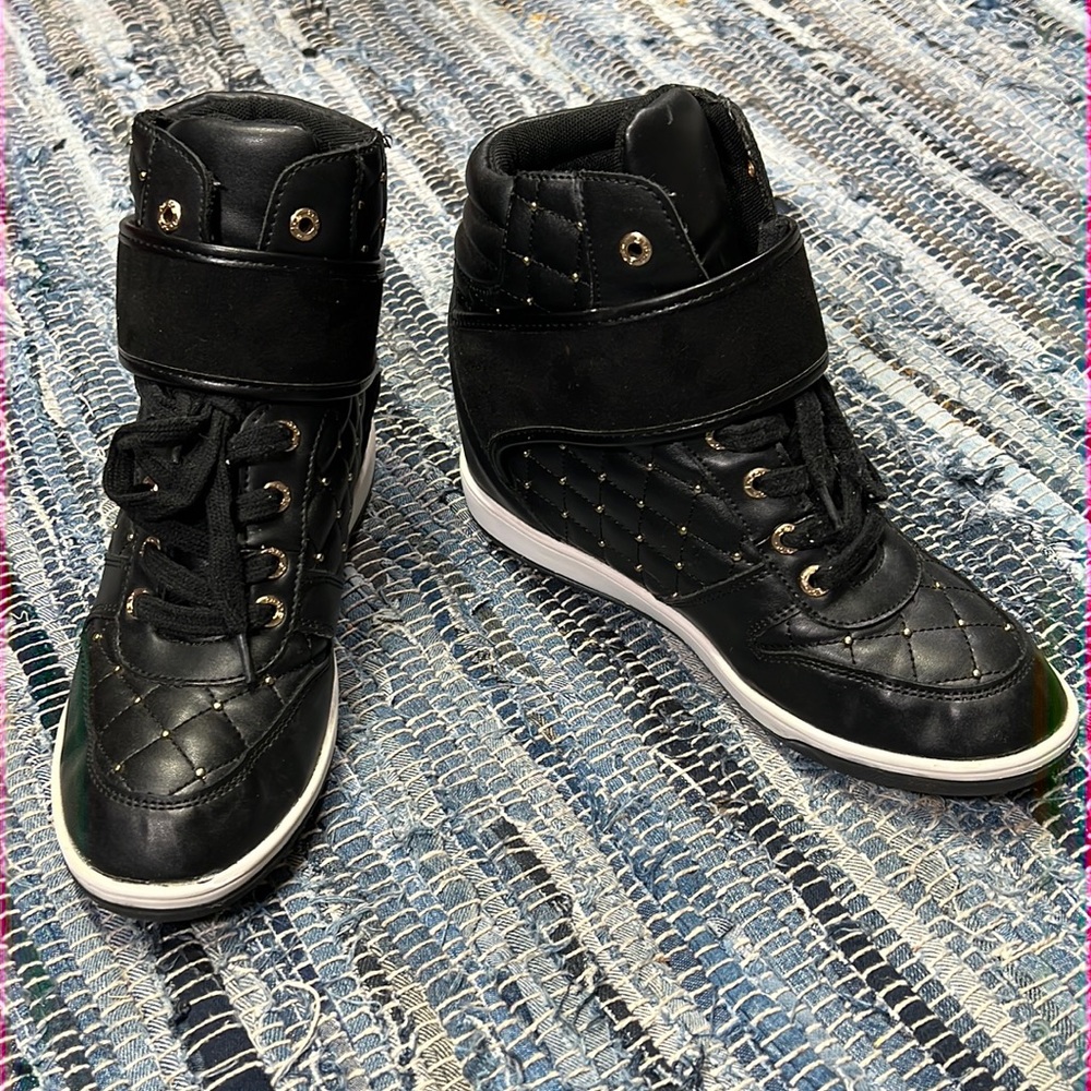 BEBE sport quilted hidden wedge heel sneaker with gold accents